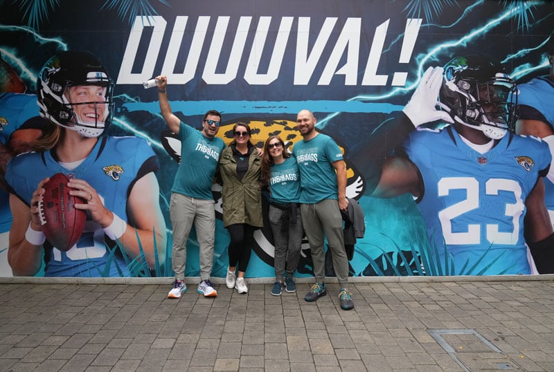 Jacksonville fans pose for a photo outside Wembley Stadium prior to the game.